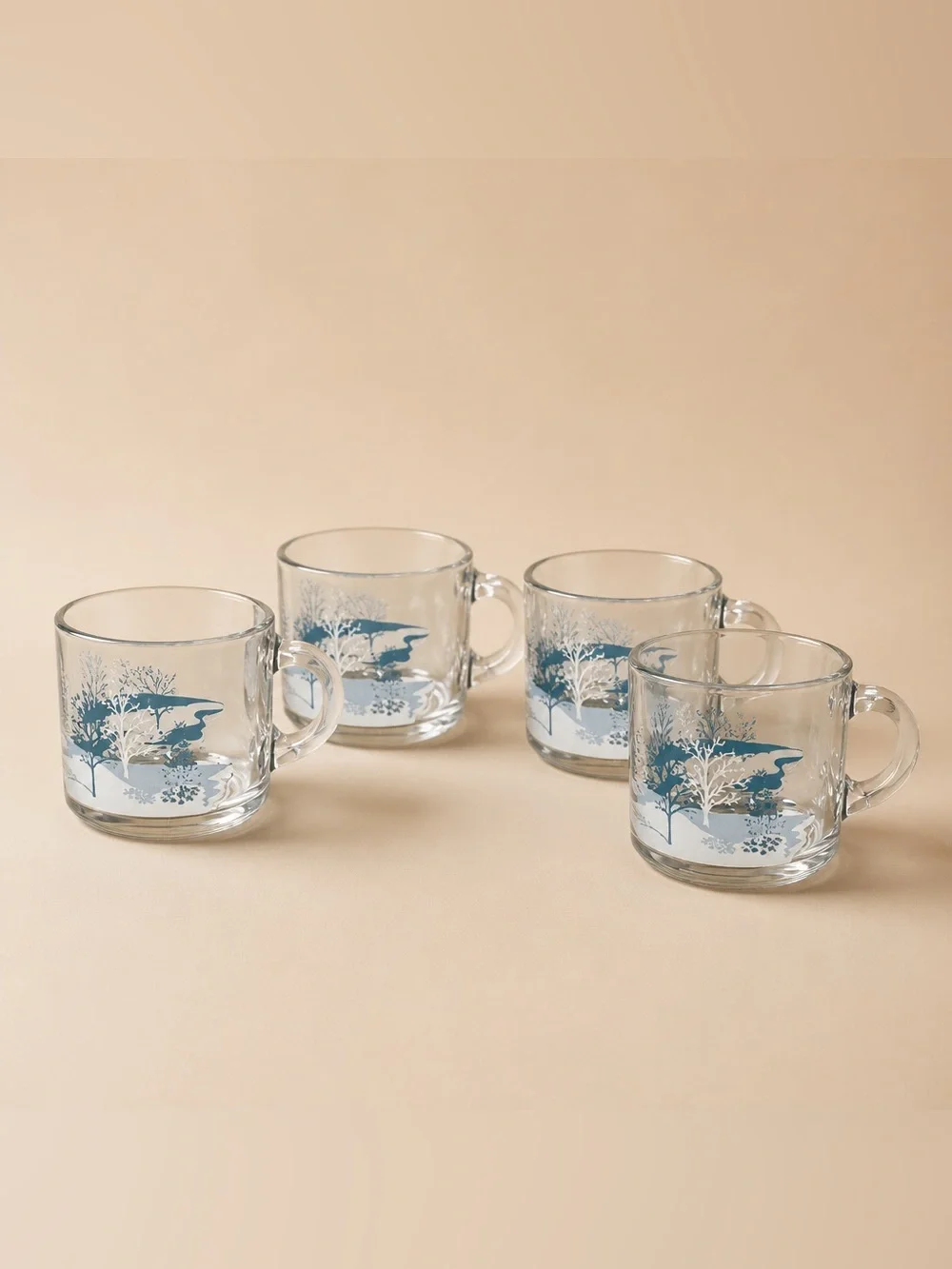 Set of 4Anchor Hocking clear glass coffee mugs featuring a blue-and-white winter